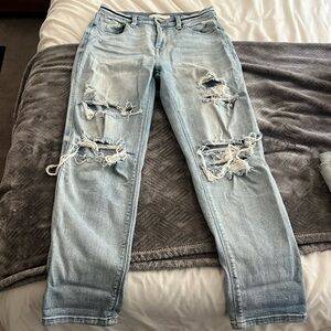 Has lots of stretch, but keeps it shape. It’s a size 5 high-rise boyfriend jean.
